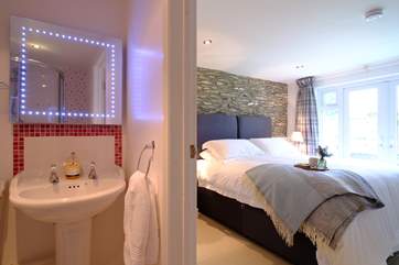 The main bedroom has an en suite shower-room.