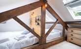 The third bedroom on the second floor is the perfect place for the younger ones for a good night's sleep. - Thumbnail Image