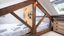The third bedroom on the second floor is the perfect place for the younger ones for a good night's sleep.