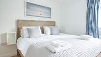 The comfortable main bedroom on the first floor offers plenty of space.