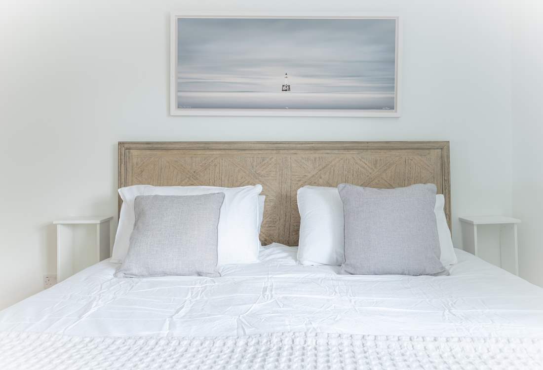 Lovely subtle decor and stunning artwork creating a home-from-home feel.