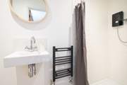 The main bedroom's en suite shower-room.