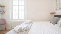 The light and airy second bedroom on the first floor.