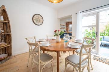 A lovely setting to gather round and enjoy supper in the beautifully decorated dining-room.