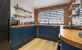 Cook up a family favourite in this modern stylish open plan kitchen. - Thumbnail Image