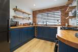 Cook up a family favourite in this modern stylish open plan kitchen.