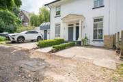 Welcome to Old Bembridge House (with the blue door), a grand property and part of a former hotel, now perfect for an Island holiday. There is parking for one car directly to the front.