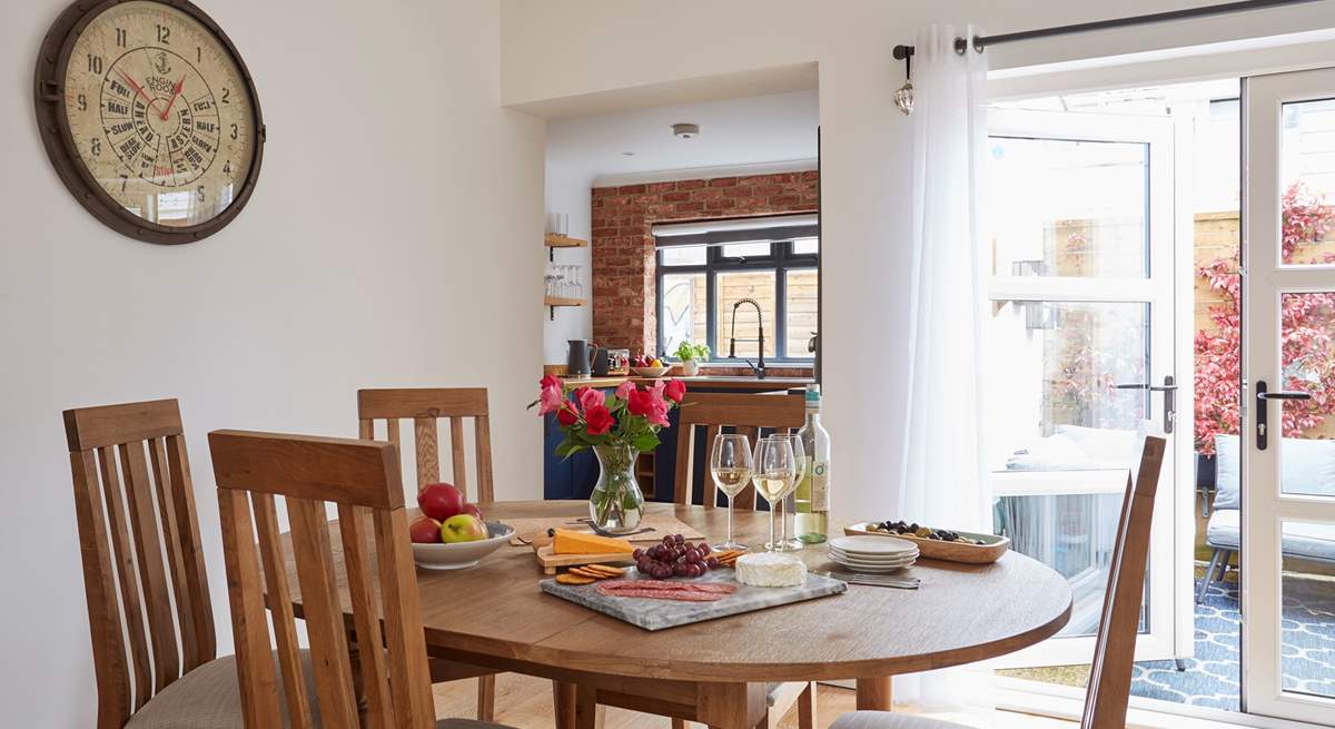 A lovely setting to gather round and enjoy supper in the beautifully decorated dining-room.