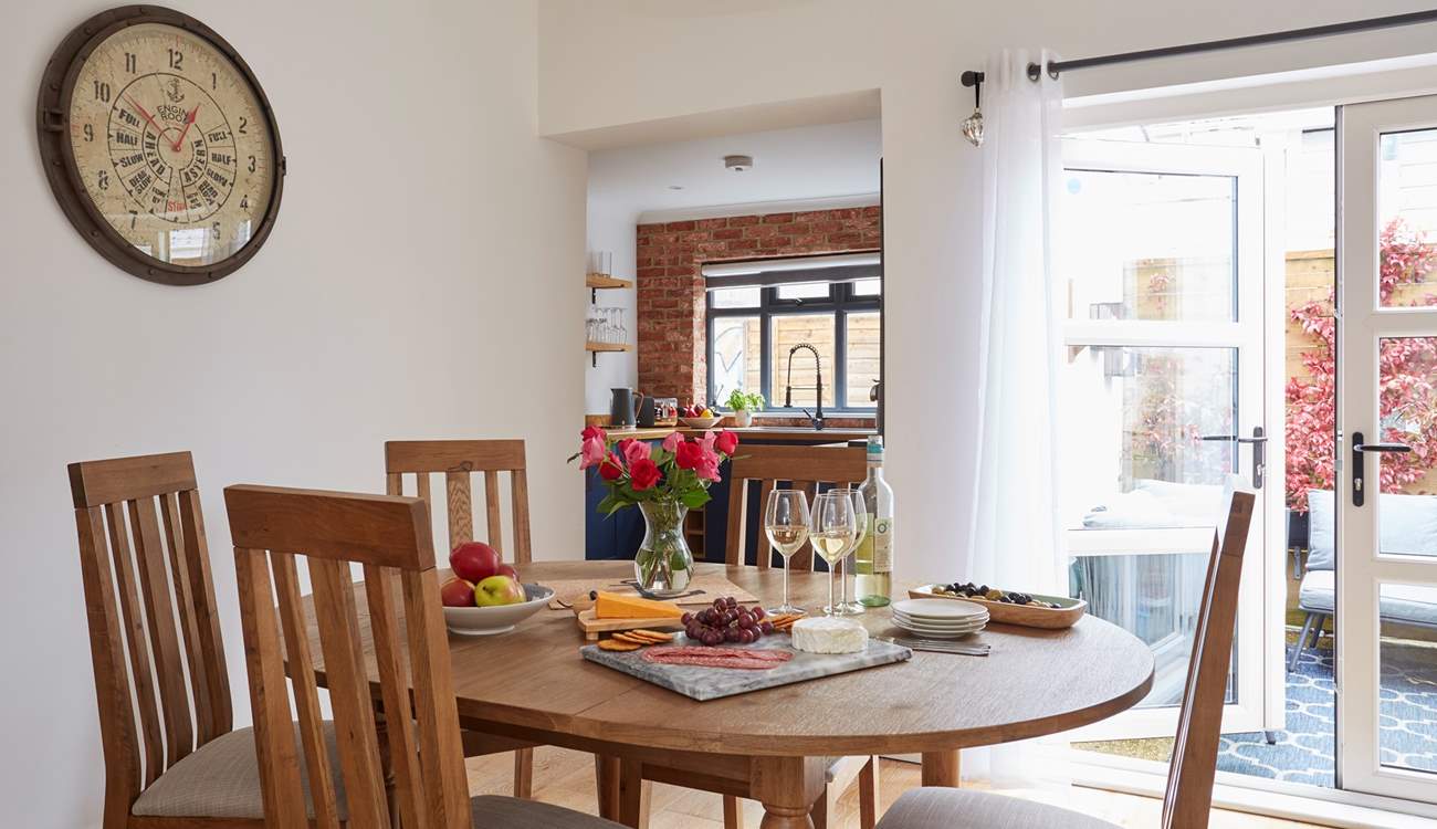 A lovely setting to gather round and enjoy supper in the beautifully decorated dining-room.
