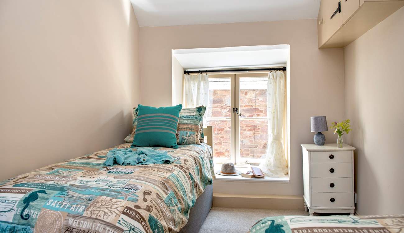 The second bedroom can be set up as twin beds or a king-size bed.