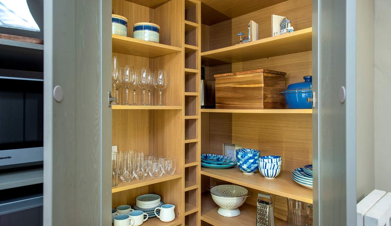 For a traditional cottage the kitchen larder/pantry cupboard is a great space.