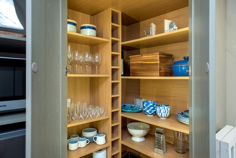 For a traditional cottage the kitchen larder/pantry cupboard is a great space.