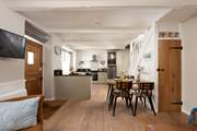 You step straight into the lovely open plan living-room.