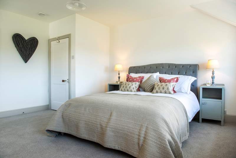 Step into bedroom one where a gorgeous king-size bed awaits.