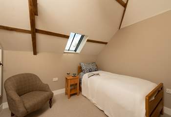 In the second bedroom the truckle bed can either be set up as a single or twins.