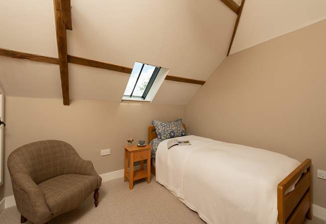 In the second bedroom the truckle bed can either be set up as a single or twins.