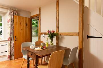 The dining-table extends to seat four if required.