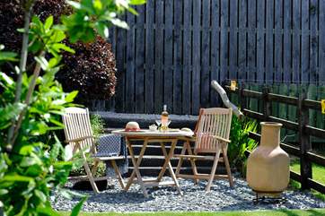 Sit out in this little sun-trap enjoying a bottle of your favourite drink.