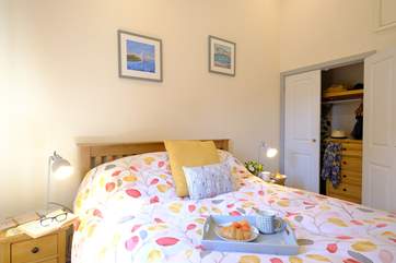 The bedroom has a double bed and plenty of storage for your holiday belongings.