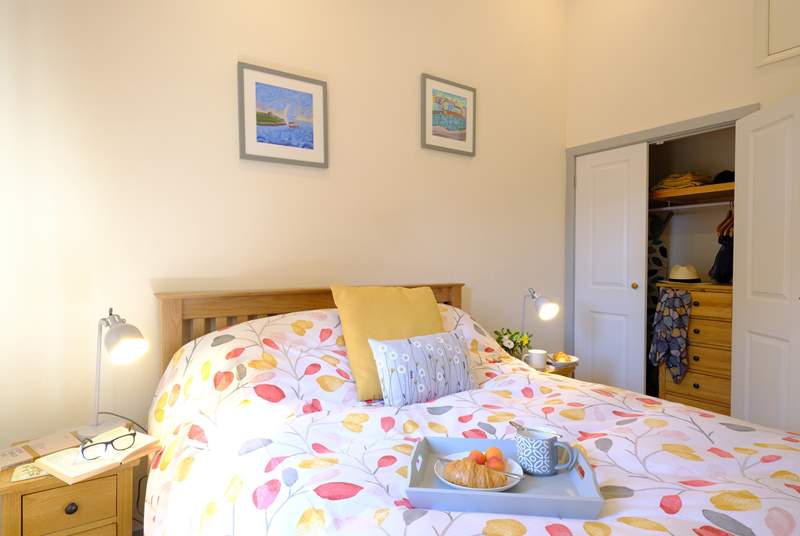 The bedroom has a double bed and plenty of storage for your holiday belongings.