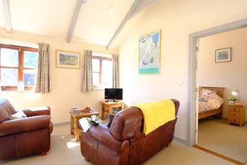 The comfortable bedroom leading off from the living-room.