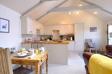 Little Downderry Barn has an open plan living, dining and kitchen areas.