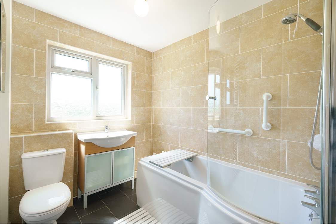 Soak in the bath on the ground floor after a day's exploring.