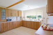 Spacious, airy kitchen. with rural and sea views.