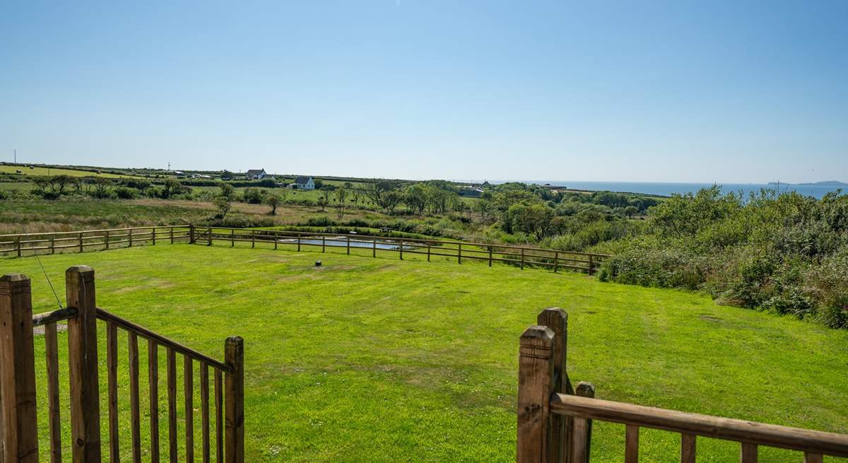 Please keep an eye on the children in the garden, although it is safely fenced, there is a deep pond beyond the fence.