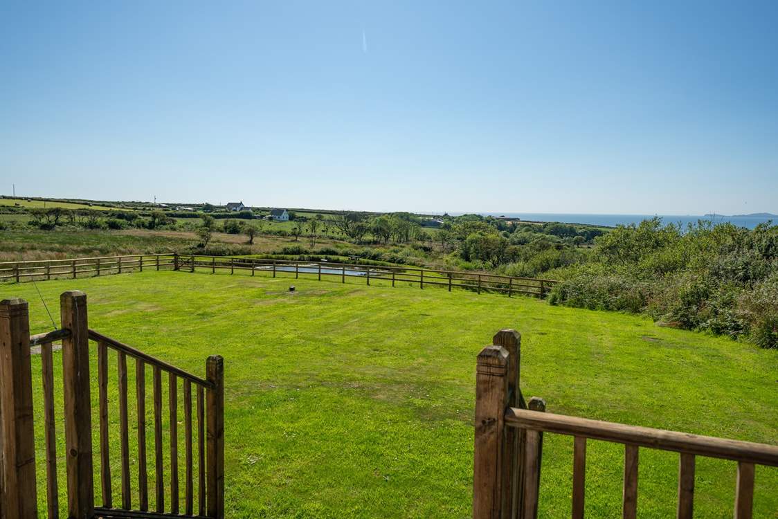 Please keep an eye on the children in the garden, although it is safely fenced, there is a deep pond beyond the fence.