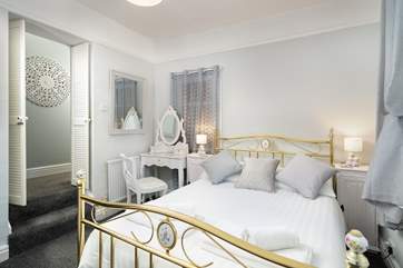 Stylish bedroom 1 has a cosy double bed.