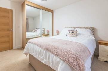 Bedroom one on the ground floor has a double bed and an en suite shower-room.