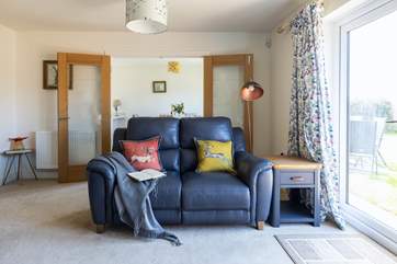 The living area is perfect for cosying up in after a day exploring the area.