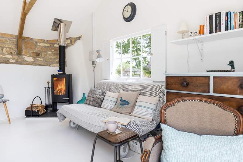 Snuggle up with a good book in front of the wood-burner.