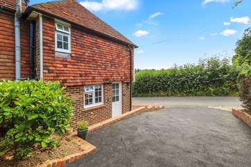 Private parking area beside the cottage for two cars.