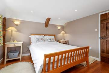 The cottage has two pretty bedrooms.