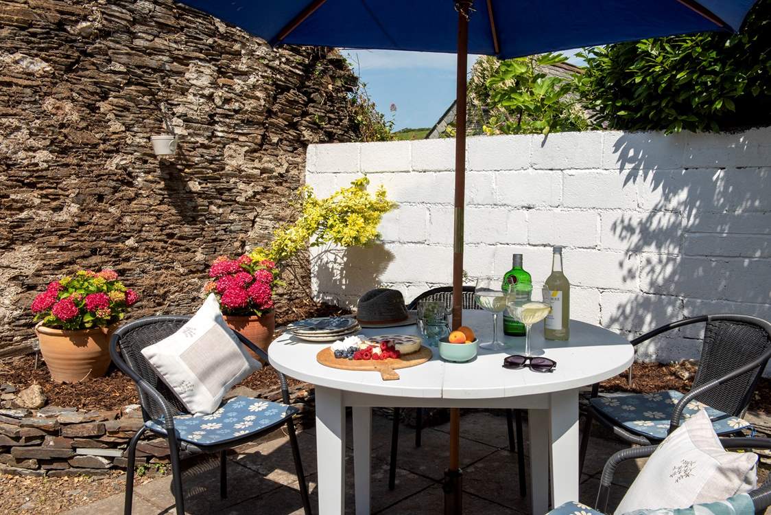 The sunny terrace is a lovely spot to enjoy al fresco dining.