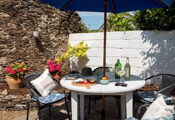 The sunny terrace is a lovely spot to enjoy al fresco dining.