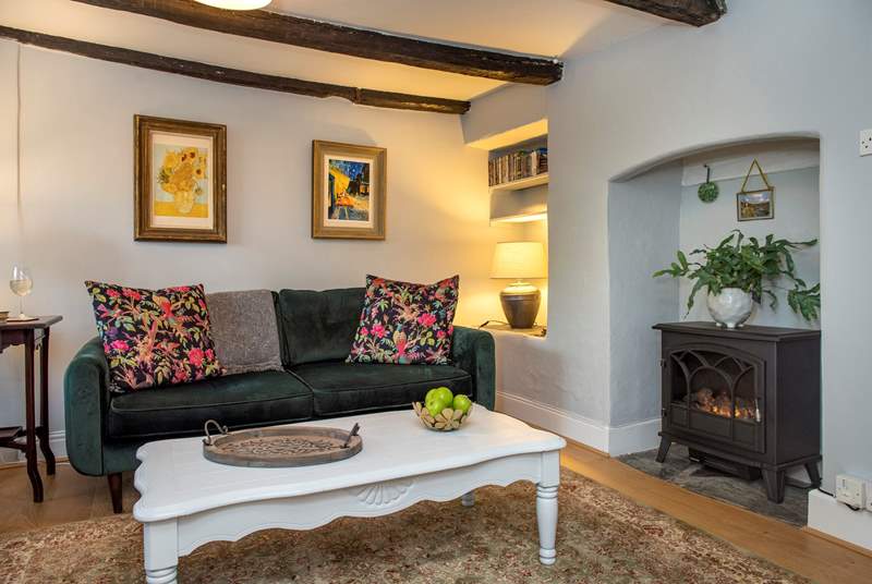The cosy sitting-room has an electric fire, perfect for those out-of-season breaks.