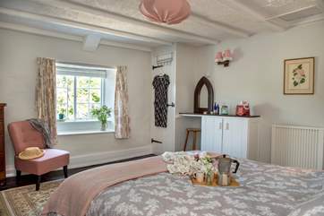 For an old cottage the main bedroom is really spacious.