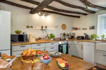 The kitchen/dining-room is the heart of the home.
