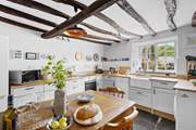 The kitchen/dining-room is the heart of the home.