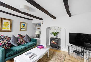 The cosy sitting-room has an electric fire, perfect for those out-of-season breaks.