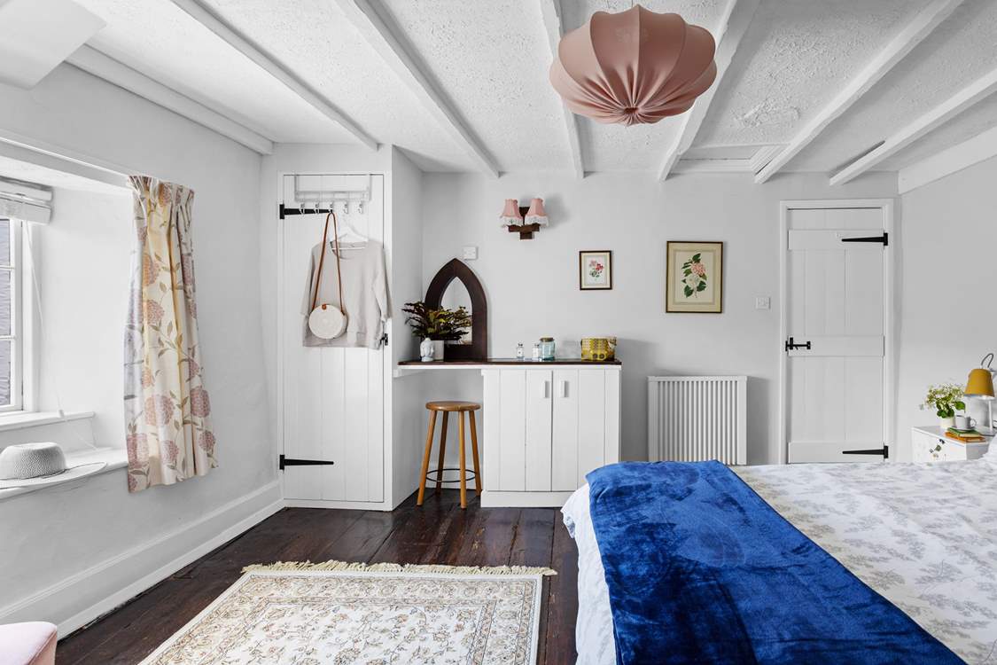 For an old cottage the main bedroom is really spacious.