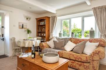 The open plan sitting and dining area will make you feel at home from the minute you step inside.