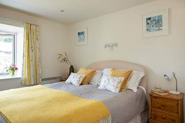 The cottage has two pretty bedrooms.