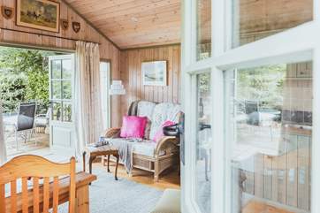 The double doors open up to the lovely outdoor space.
