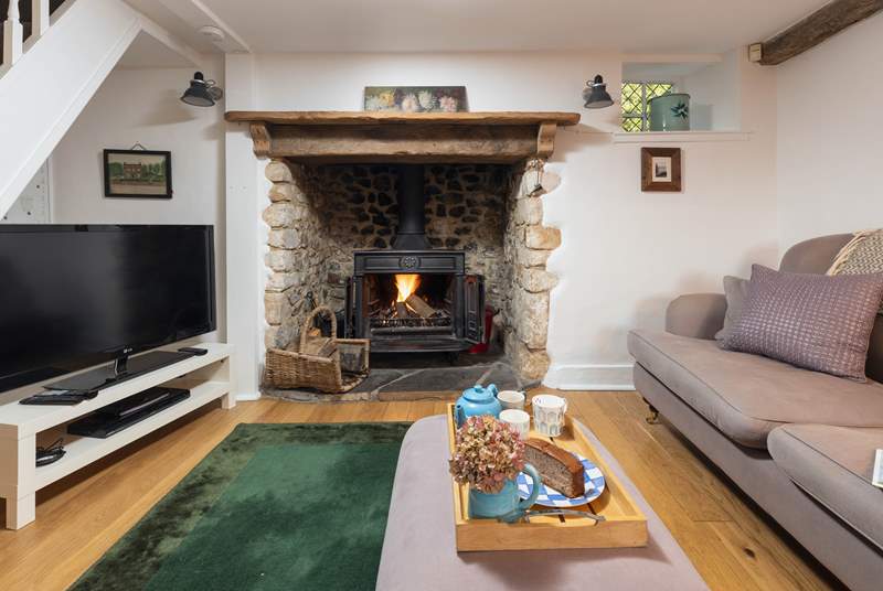 Warm your toes on the wood-burner after a day of exploring.