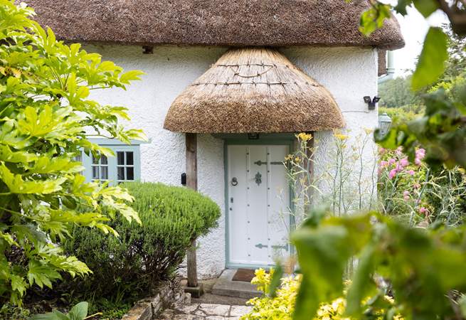 This traditional thatched cottage is oozing with character.