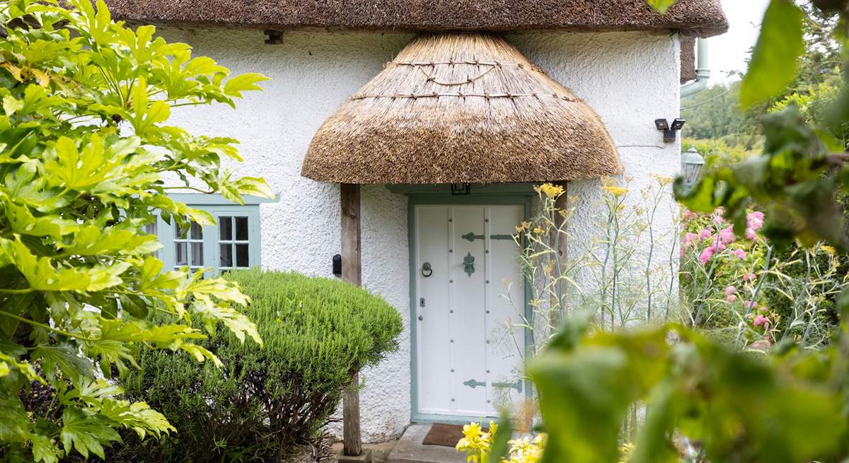 This traditional thatched cottage is oozing with character.